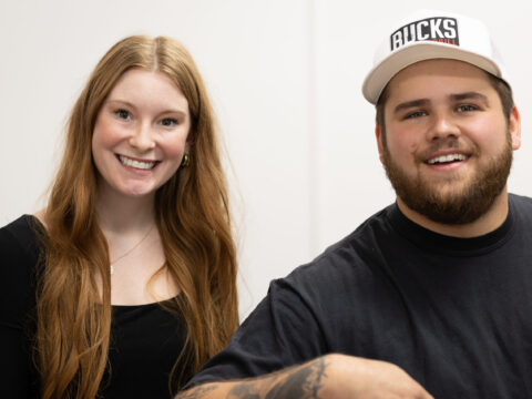 MavRadio.FM host Bayliegh Koch and local country artist Tyler Anthony share a laugh in the studio during the “Wear Black, Give Back” broadcast. In their conversation, Anthony reflected on leaving college to pursue his passion, saying, “I started playing music at bars, pizza places, and family events—anywhere I could. Now I’m living my dream every single day.”