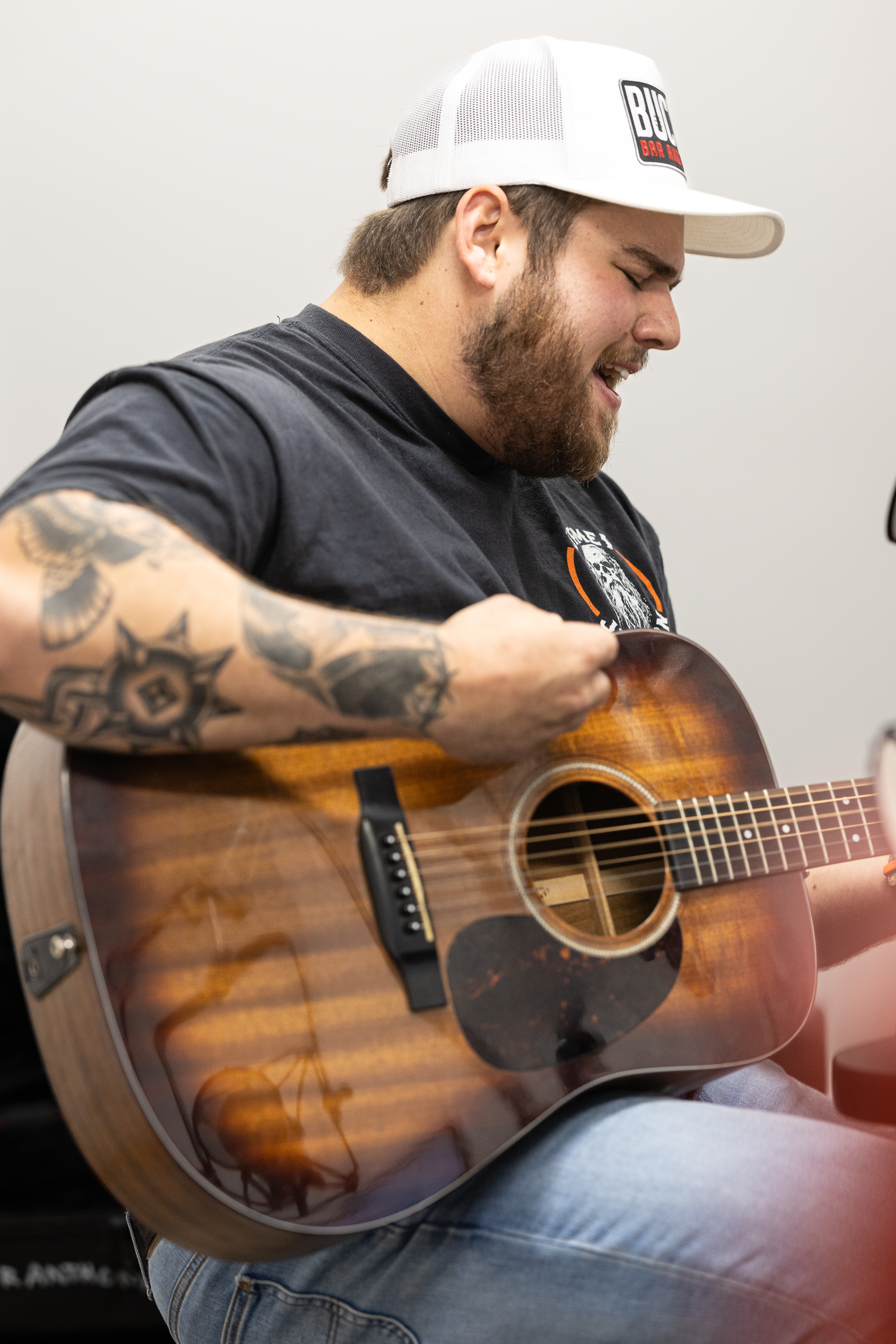 Local country musician Tyler Anthony performs an acoustic set live in the MavRadio.FM studio during the “Wear Black, Give Back” broadcast at the University of Nebraska at Omaha.

