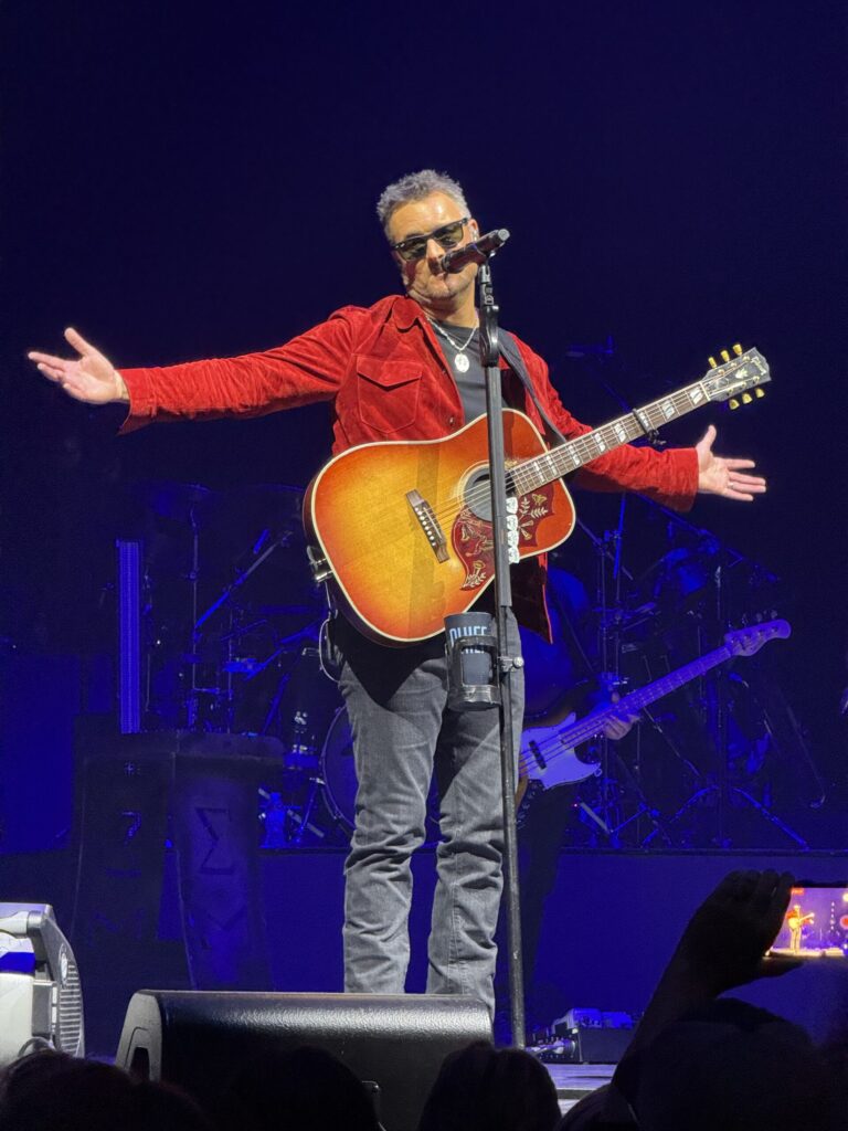 Eric Church performs in Omaha, opening his arms to the crowd in appreciation during his latest tour stop.