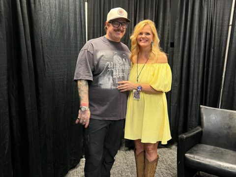 Backstage photo of HARDY smiling with a fan before his Omaha show